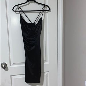 Tight black thin strap dress